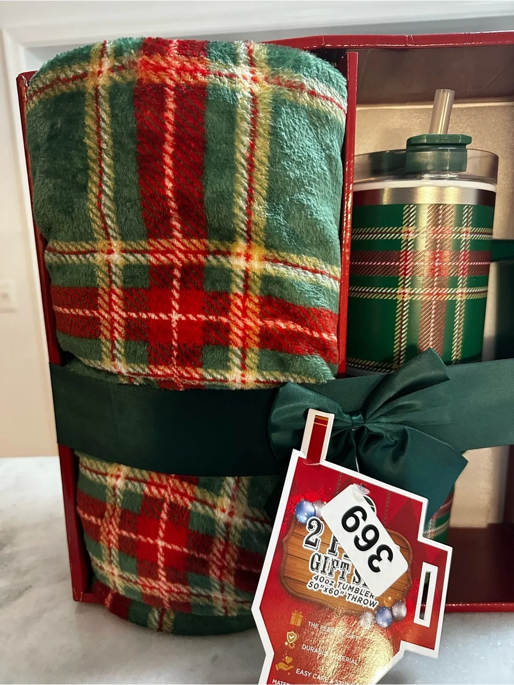 Festive Christmas plaid gift set. Featuring cozy blanket and Insulated Tumbler